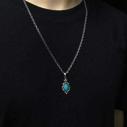 Floral Pattern Sterling Silver Oval Turquoise Pendant