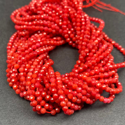 Faceted Round Coral Beads