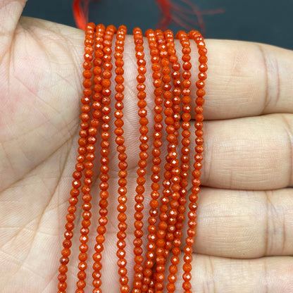 Faceted Round Coral Beads