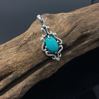 Floral Pattern Sterling Silver Oval Turquoise Pendant