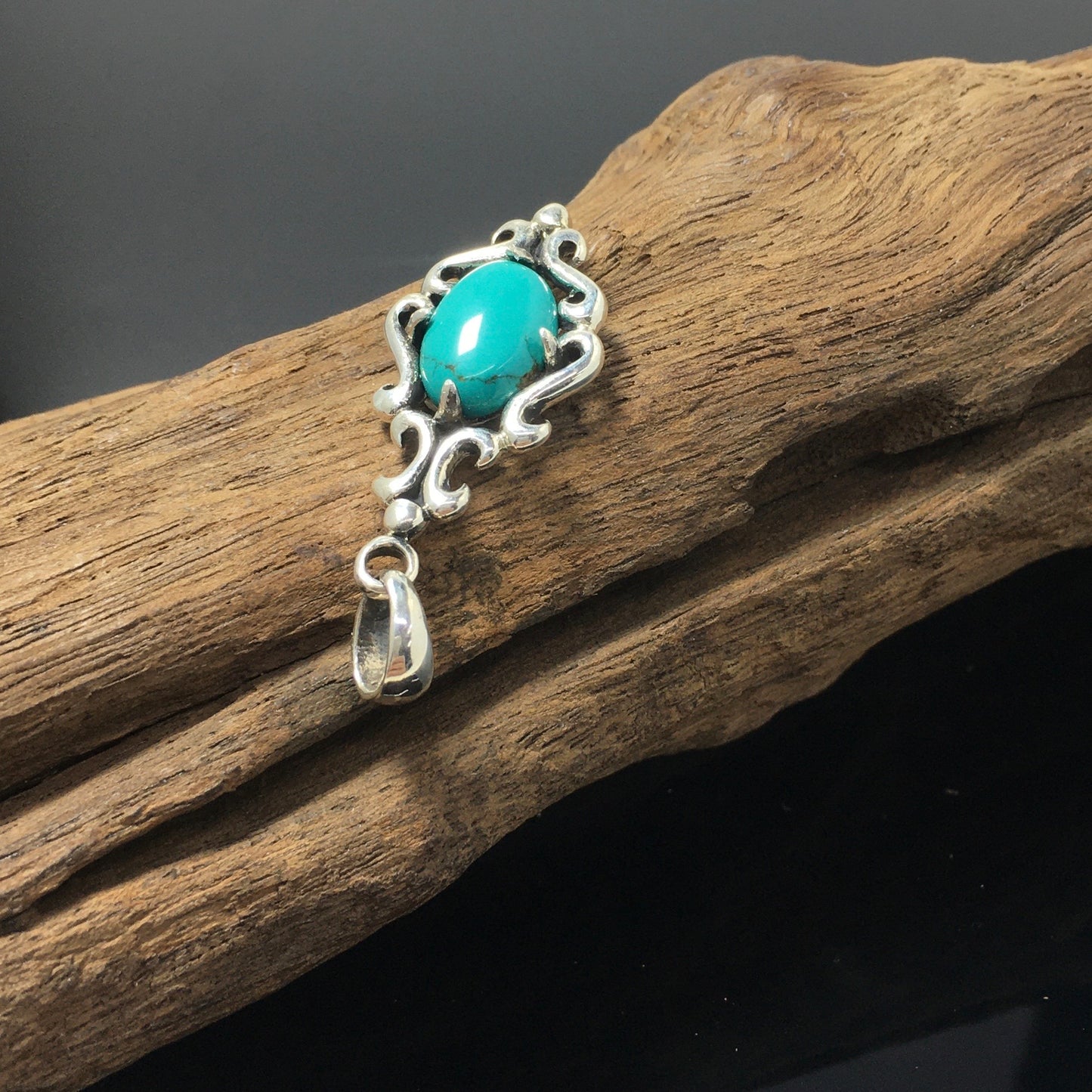 Floral Pattern Sterling Silver Oval Turquoise Pendant